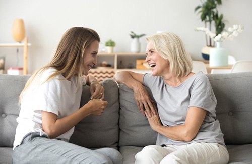 Ladies converse on couch