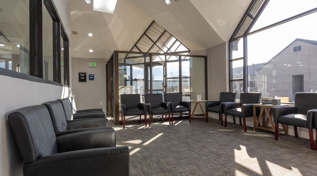 Reception area of Orem dental office with glass walls and doors
