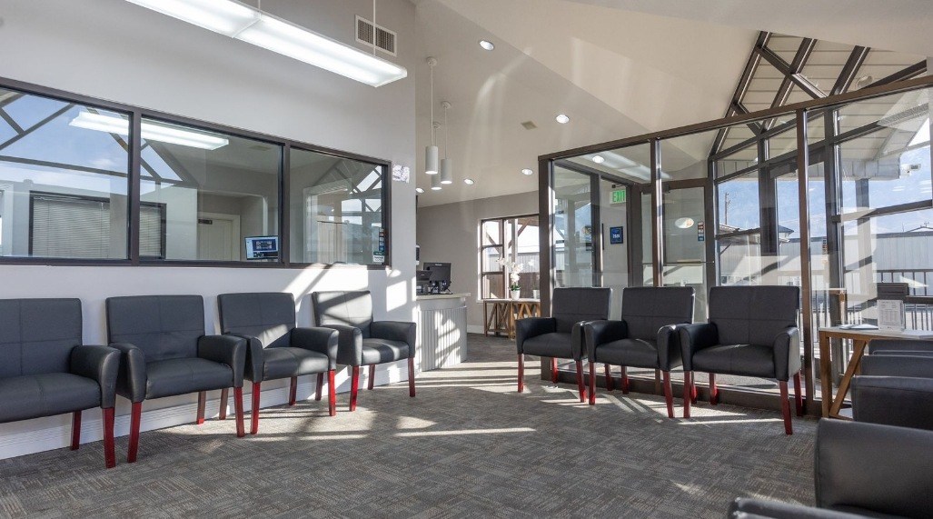 Sunlight streaming in through walls of reception area