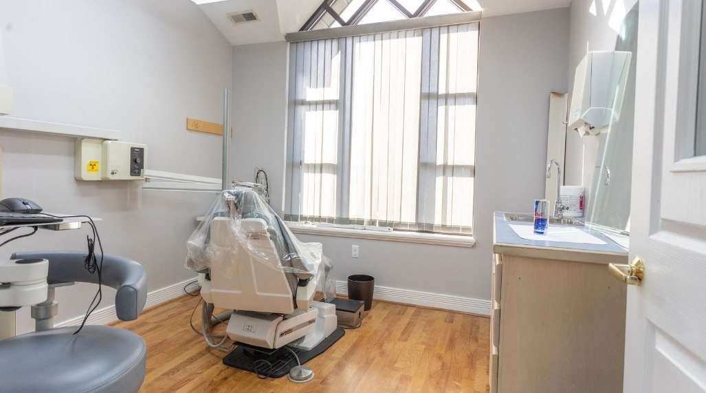 Small screen attached to dental scanning device in hallway