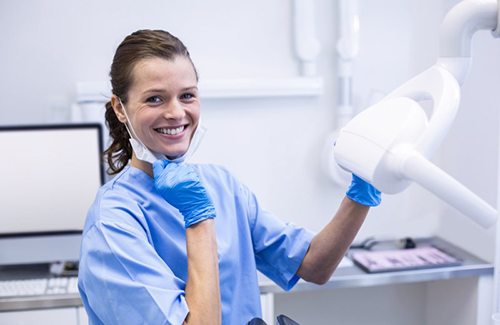 Dental hygienist smiles